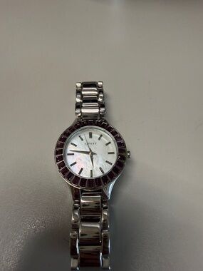 DKNY Silver Bracelet Watch with Purple Crystal Bezel and Mother-of-Pearl Dial